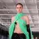 Ella Emhoff walks the runway for Prabal Gurung. (We’d love not to have to star out her nipple, but ironically, certain rules prevent us from showing this nudity.)